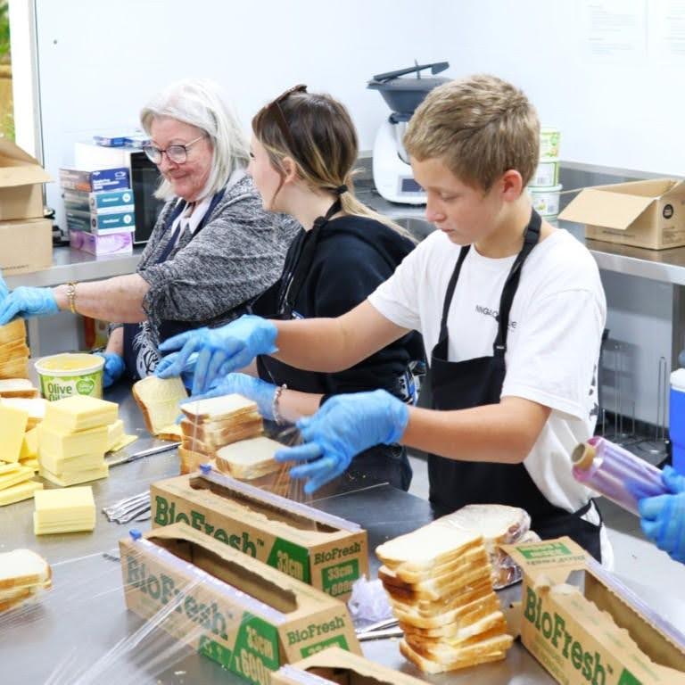 Rockingham montessori school students making sandwiches